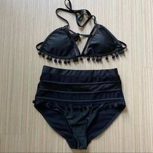 Black bikini with net and pom pom accent